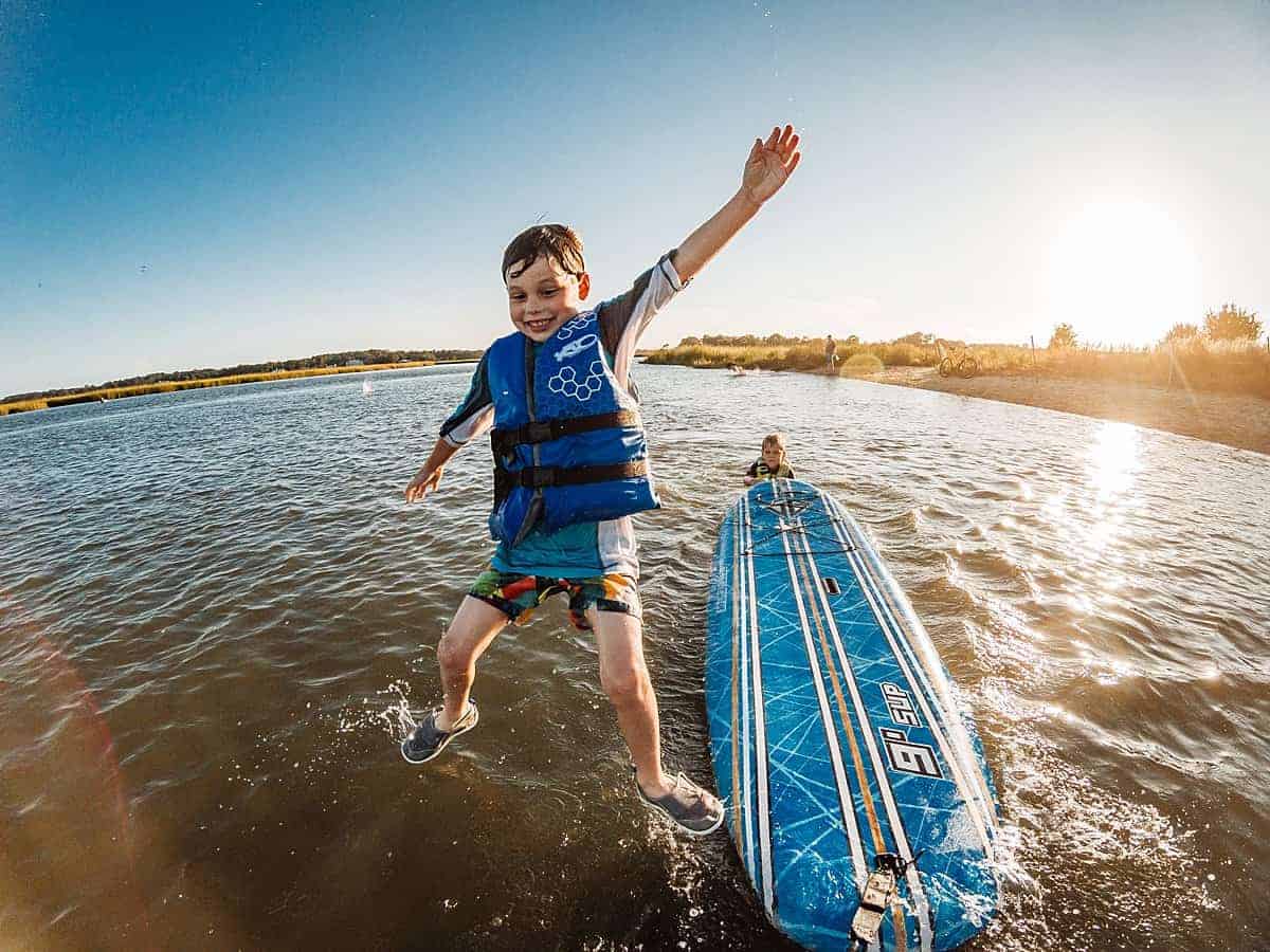 stand up paddle boarding with kids - favorite water activities for kids