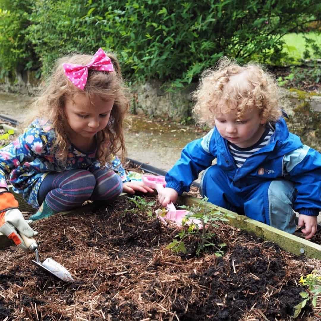 backyard play space for gardening with kids