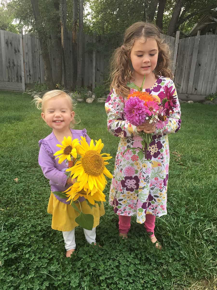 Teaching kids where their food comes from - kids with flowers