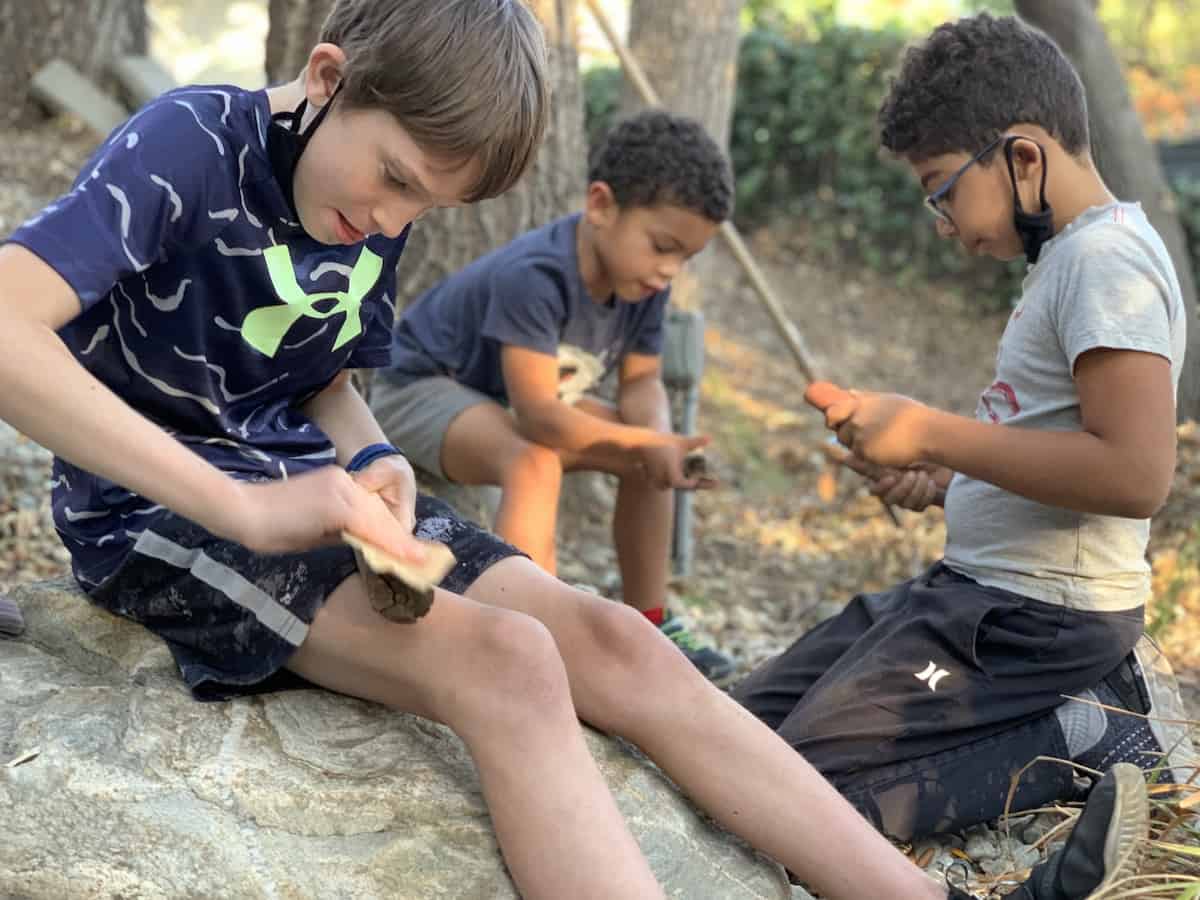 Whittling with kids - learning a new skill as an outdoor new year resolution