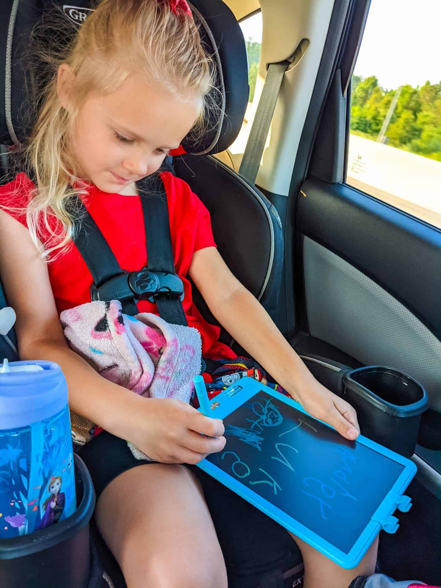 Screen free road trip ideas with kids, must haves when traveling with kids, favorite drawing toy