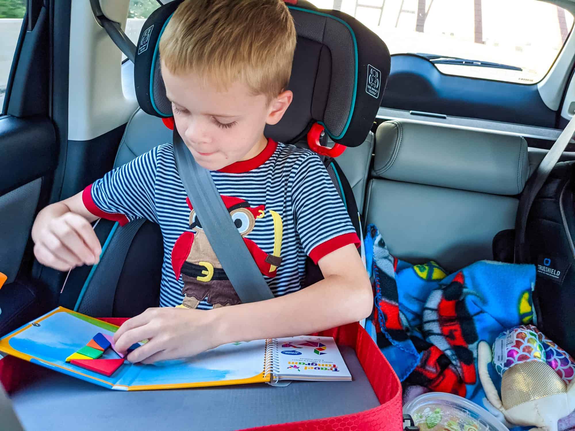 Screen free road trip ideas with kids travel trays, keep kids occupied in the car, must haves when traveling with kids