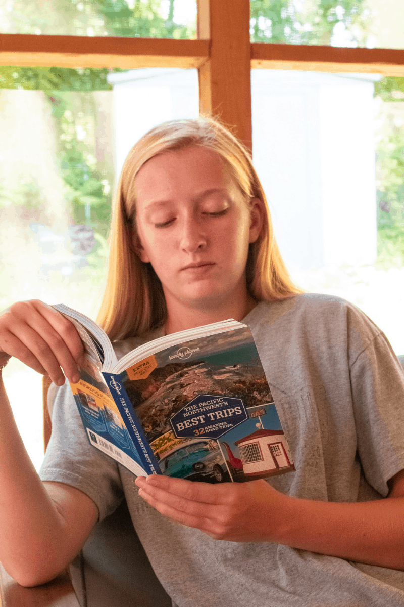 Map reading skills for teens using a guide book