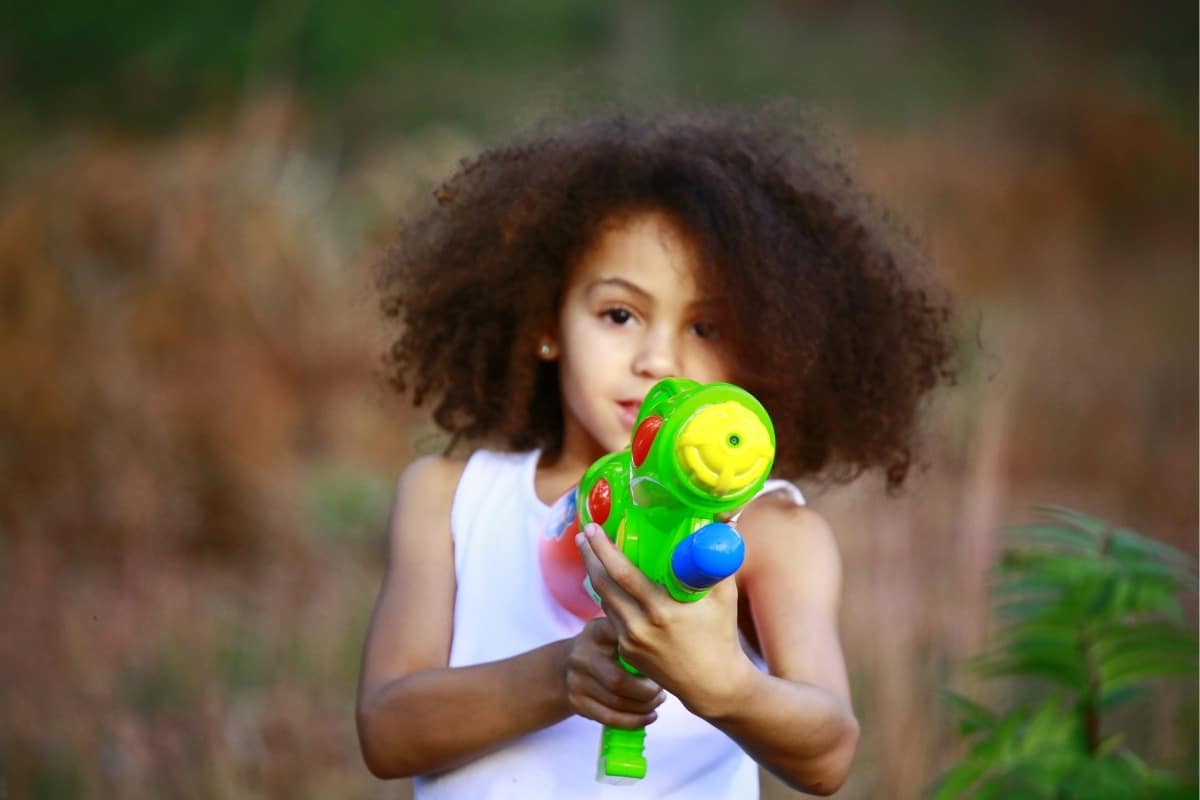 Water Pistol Painting is the best outdoor art activity ever! - Messy Little  Monster