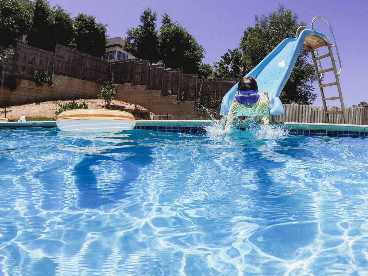 Fishing in the childrens pool. Little boys games Stock Photo by