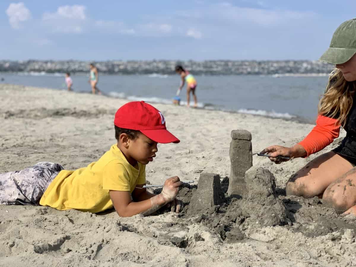 Sandcastle building with kids- carve & add detail