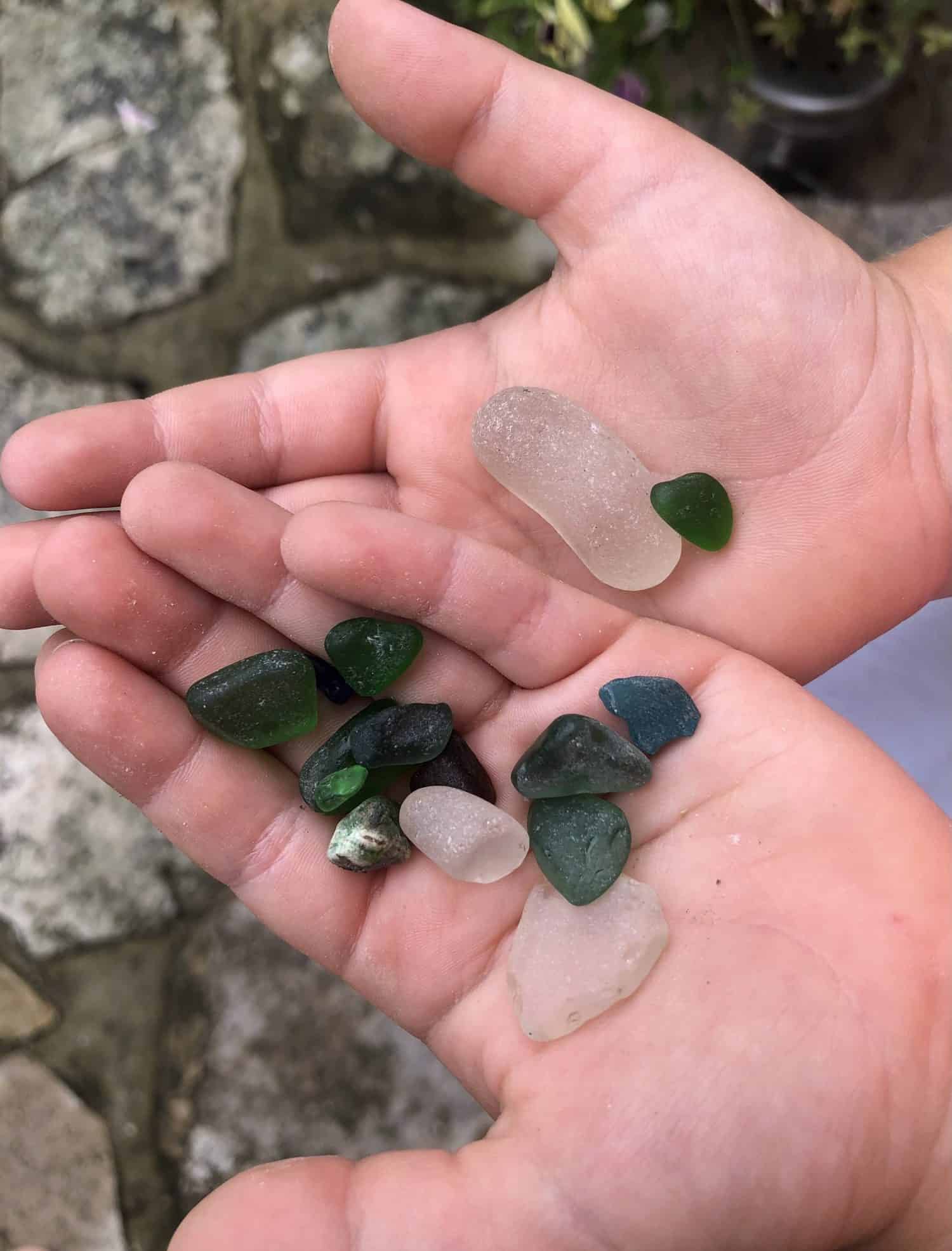 We love looking in the shingle for sea glass gemstones