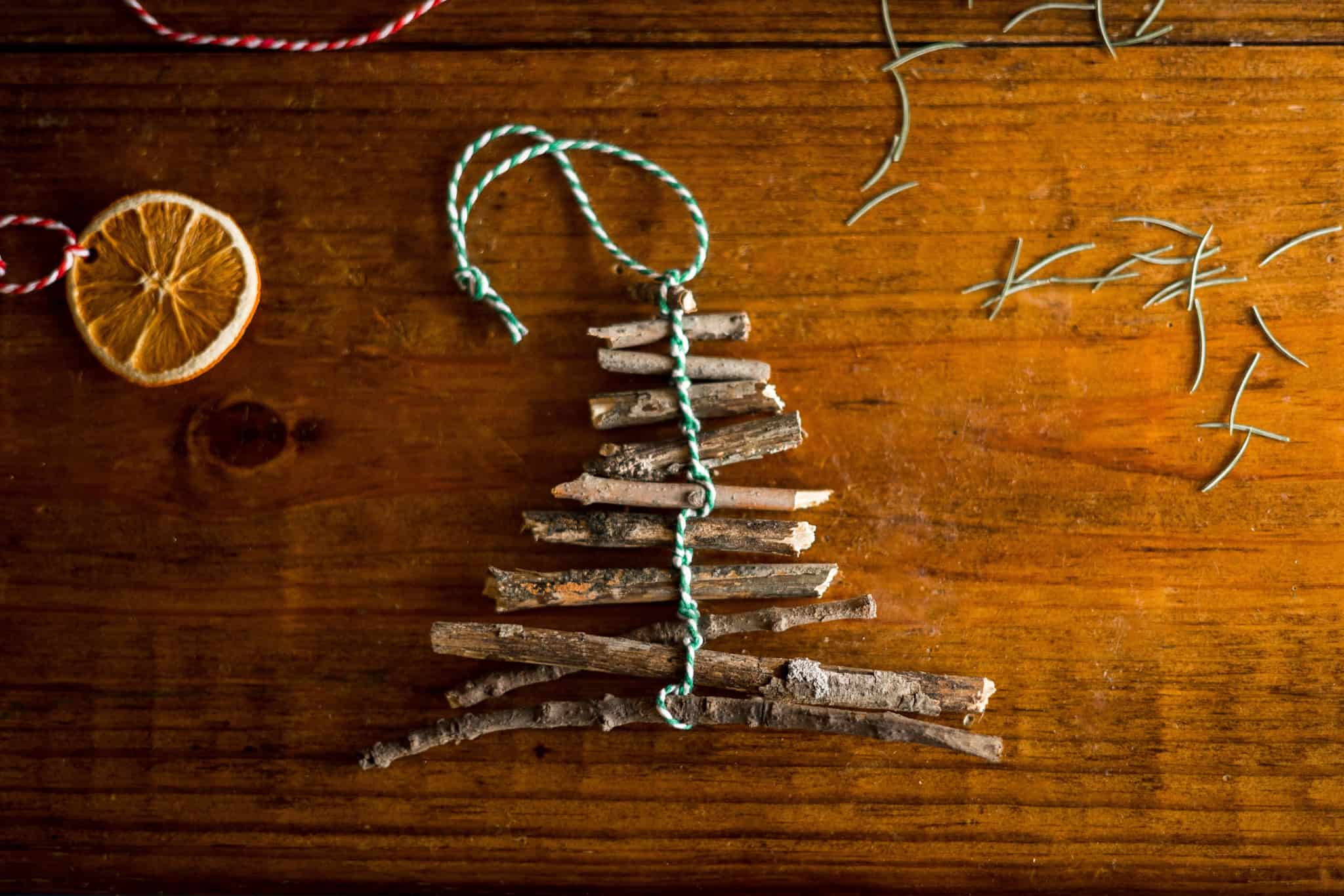 Christmas tree made of sticks and string -diy nature inspired holiday ornaments for kids