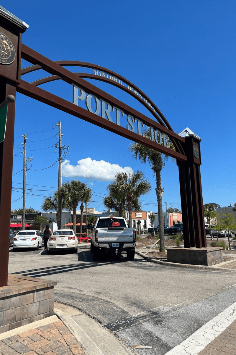 Arched sign reading Port St. Joe over a street intersection in Gulf County Florida