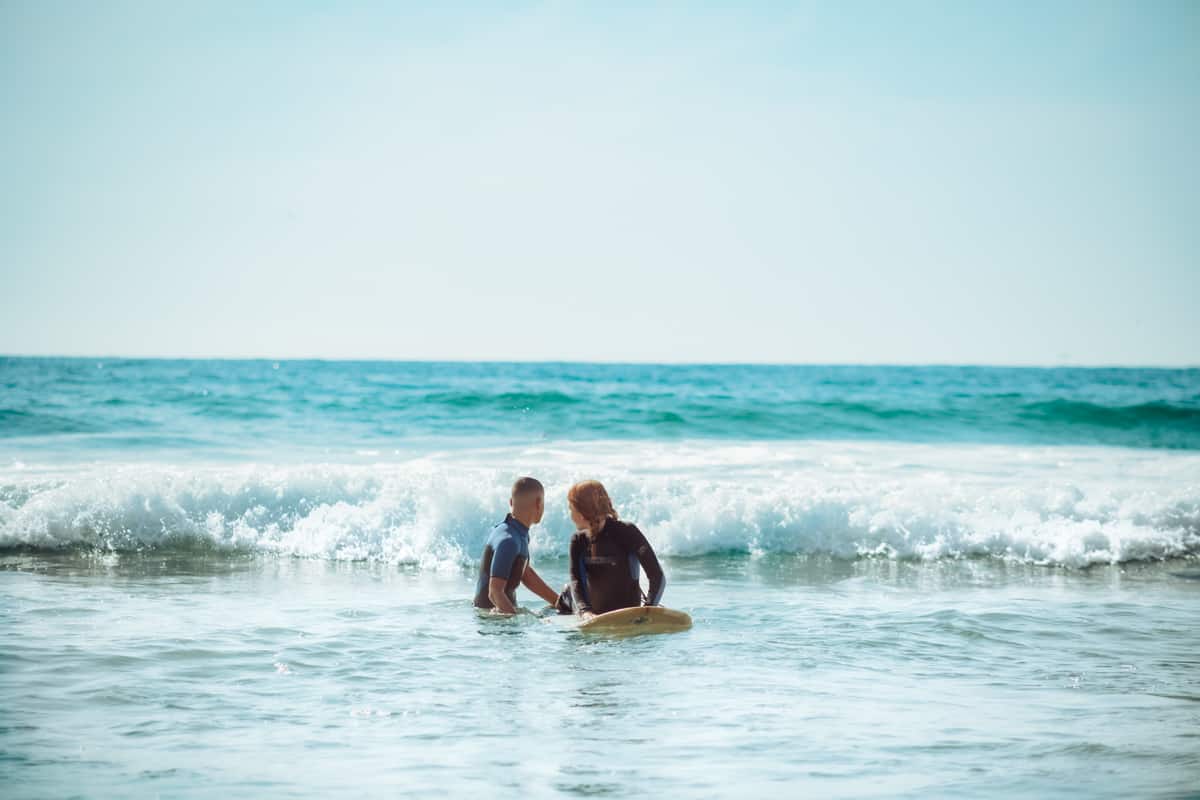 teaching kids how to surf - surfing with kids