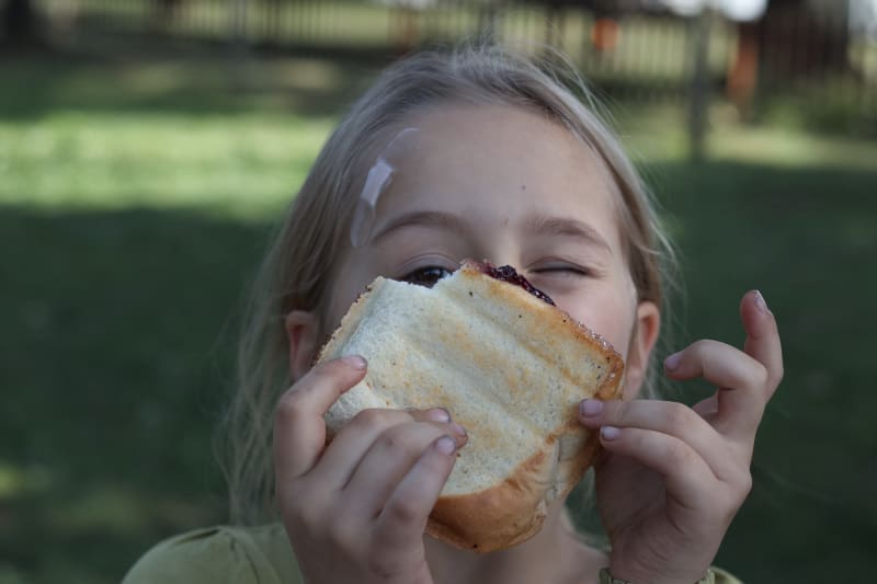 kids eating hobo pies - best camping meals and foods for families
