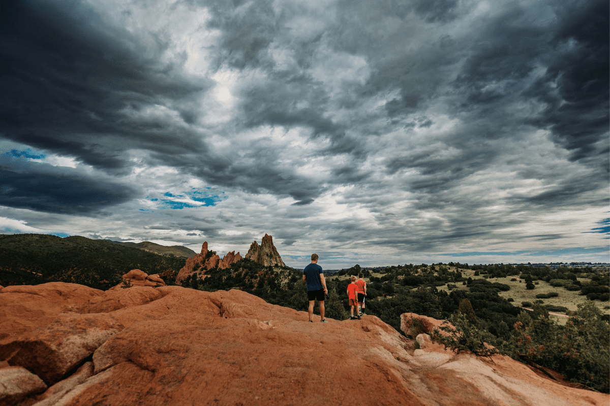 family enjoying garden of the gods in colorado up high near the clouds 