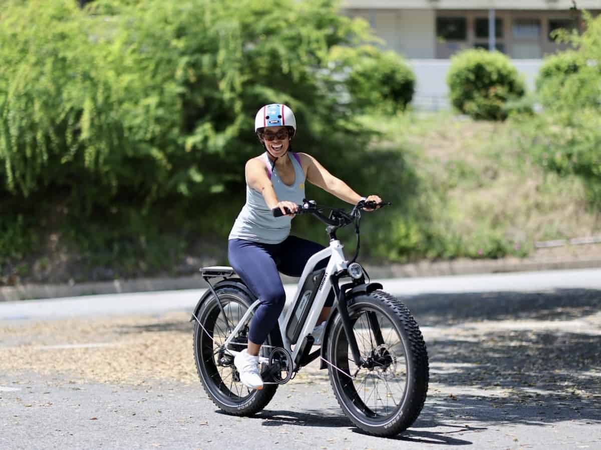 Woman riding a Himiway e-bike -himiway ebike review - step thru cruiser