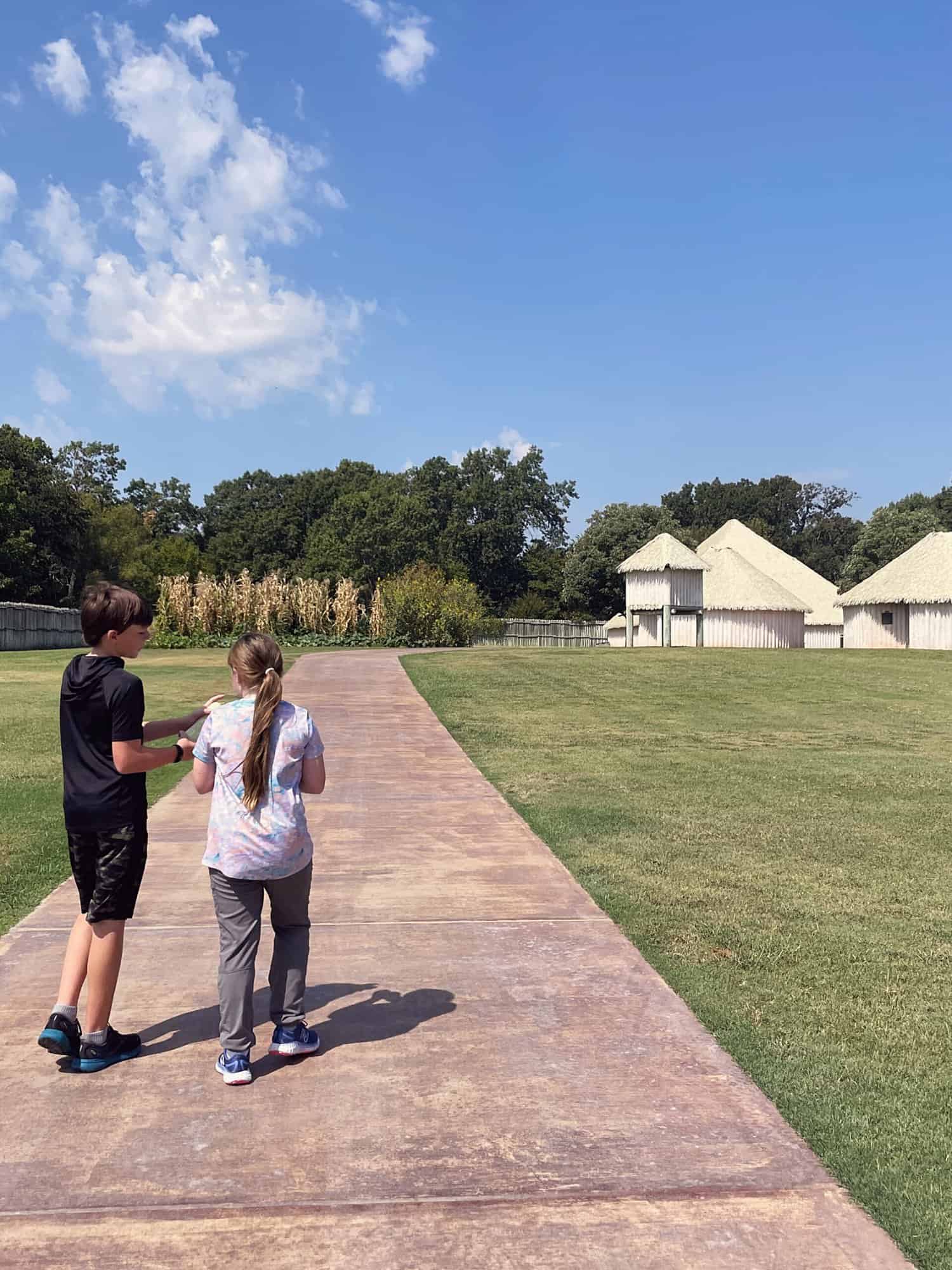 Chickasaw cultural center outdoor village with kids - learning about Native American history and Indian territory