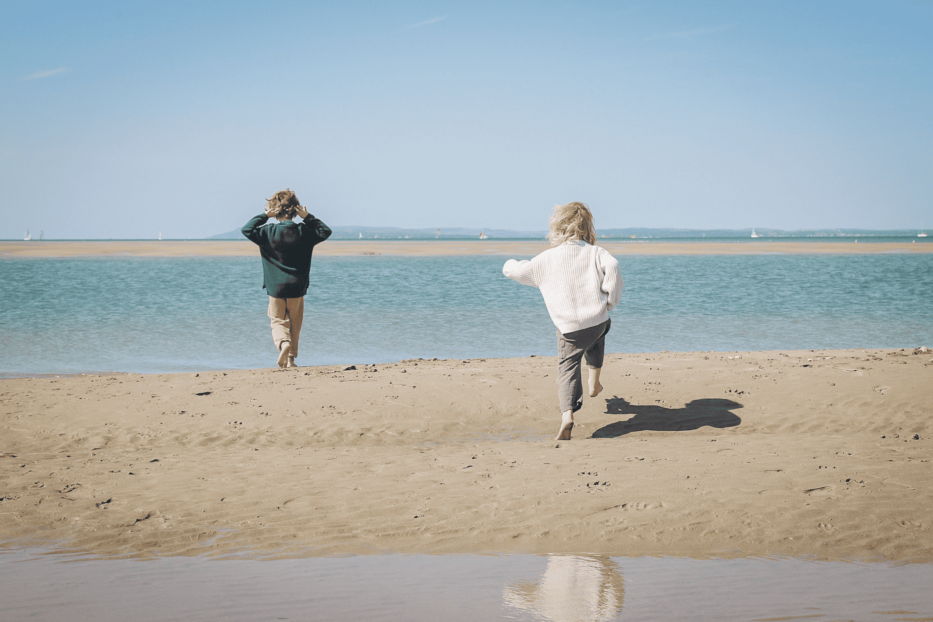 Children playing on the beach as West Wittering