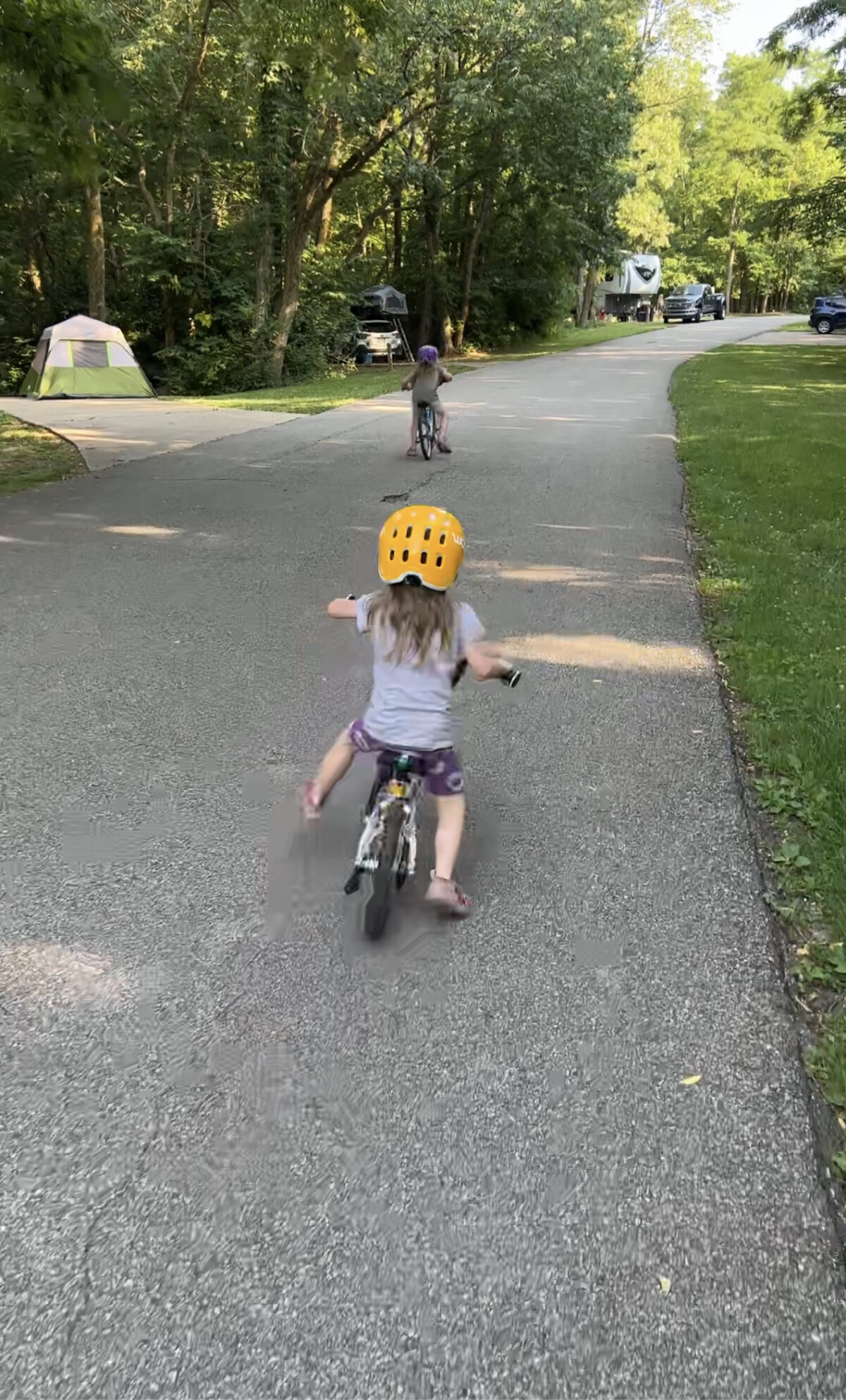 Bringing our kids' Woom Bikes along was worth it. After seeing their parents bike, they wanted their turn too! 