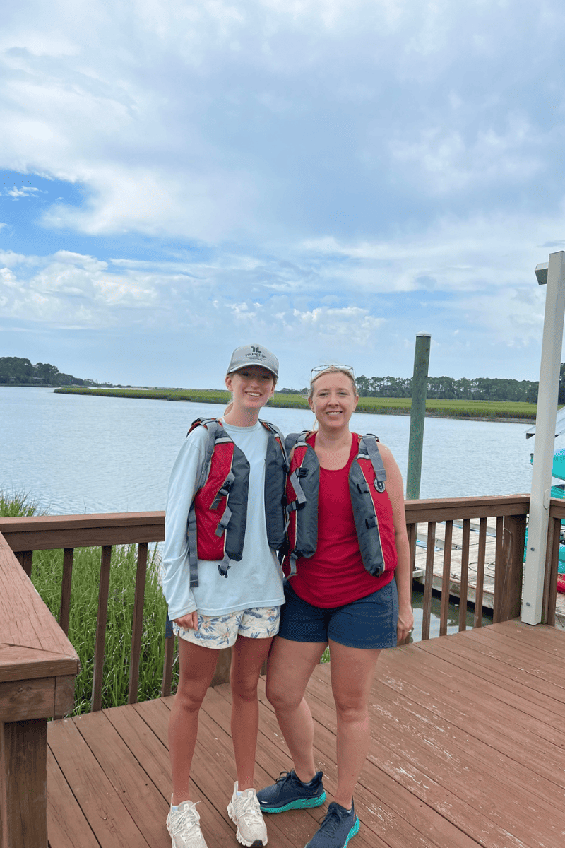 Mother Daughter in life vests after a kayak adventure on the Kiawah River