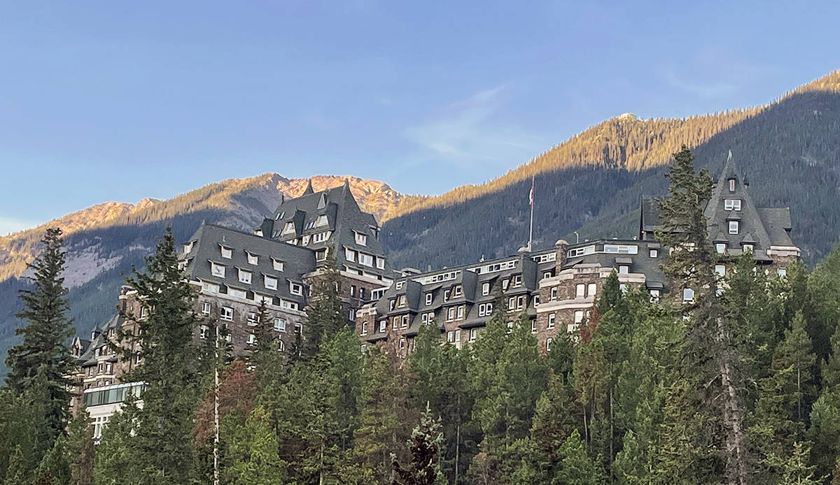 The Fairmont Banff Springs towers above the river valley in Banff.