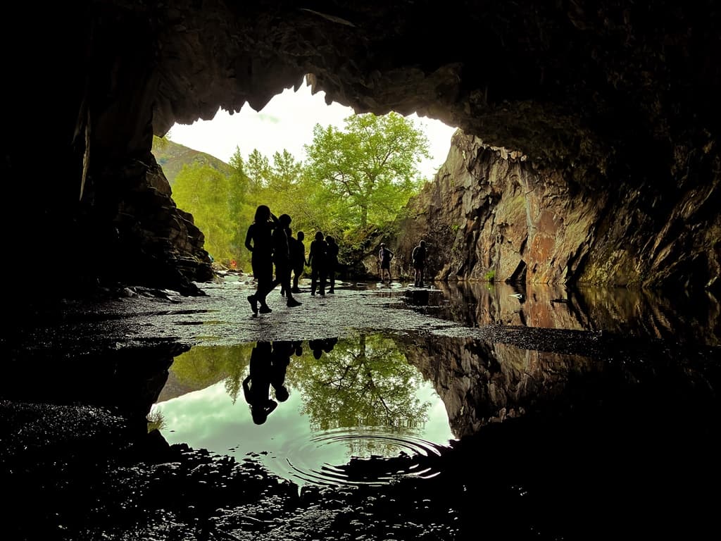 Silhouettes inside Rydal Cave