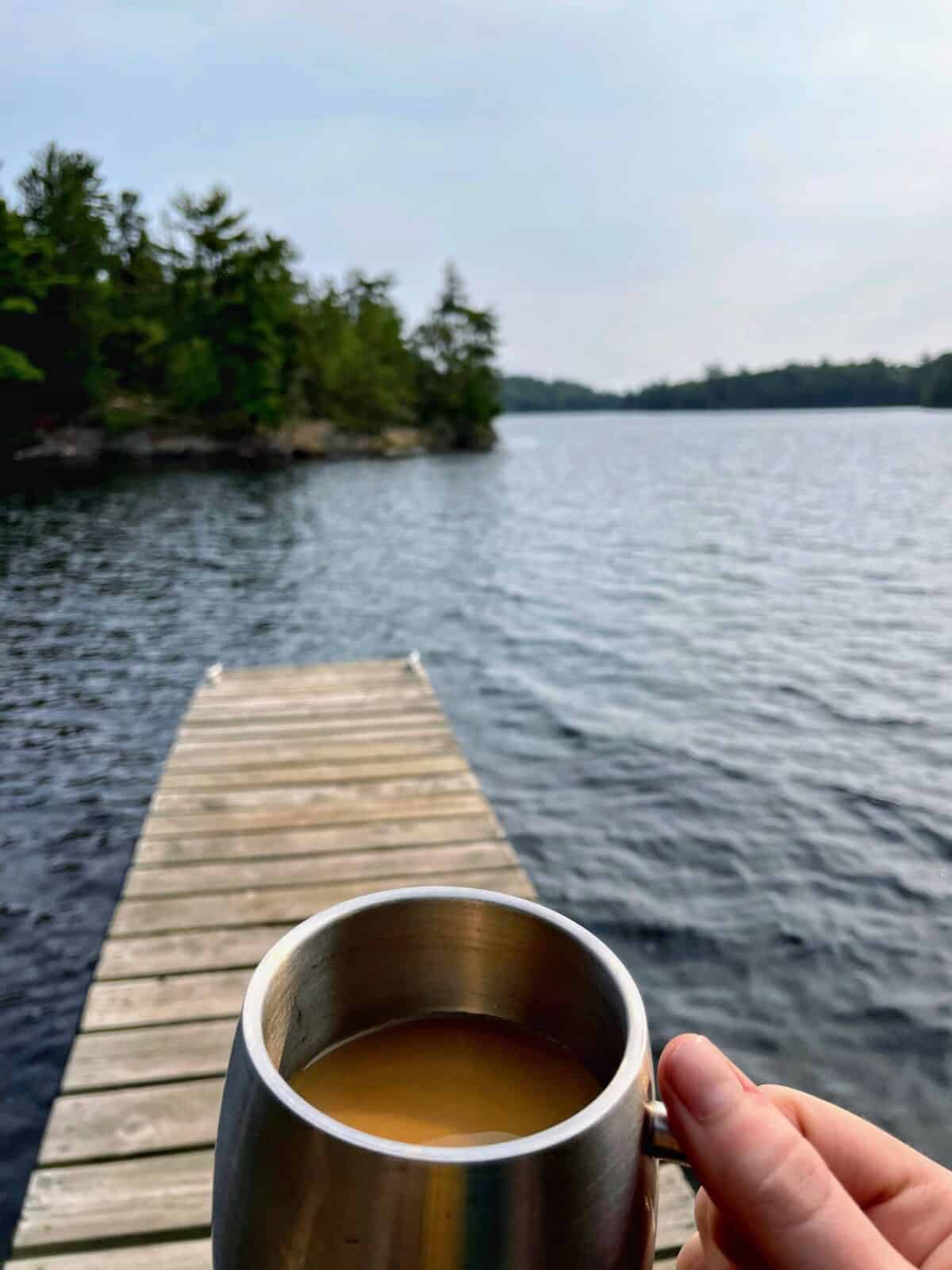 coffee and a dock on a camping trip on a remote island